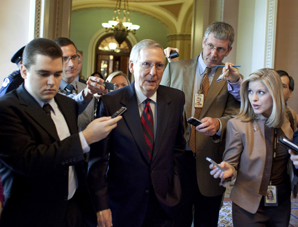 Senate Minority Leader Mitch McConnell leaving a debate with reporters Senate Minority Leader Mitch McConnell leaving a debate with reporters